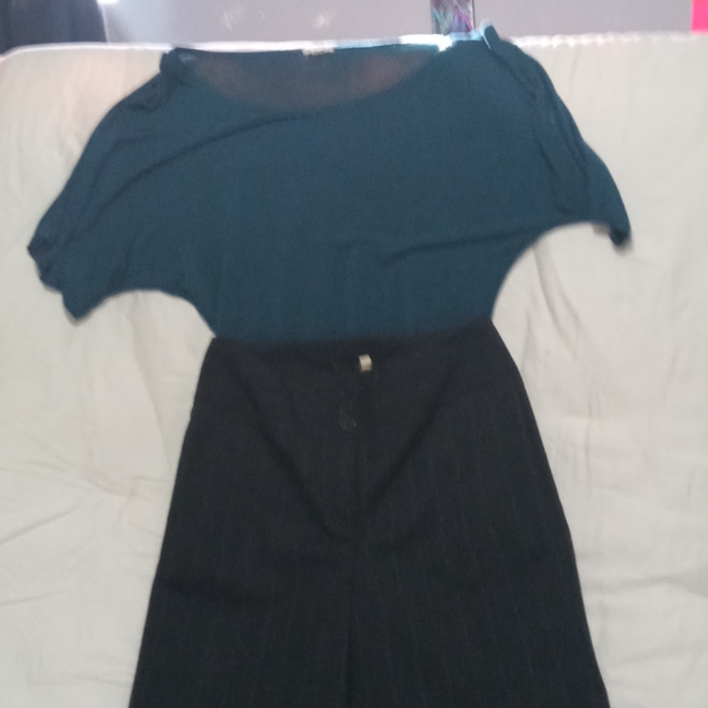 Blue pin striped slacks with green cotton blouse